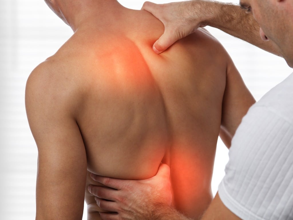 acupressure back pain relief concept male patient physiotherapy picture id1210178455
