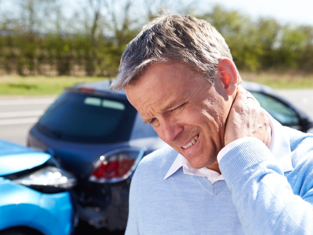 man with whiplash after traffic collision picture id455681155